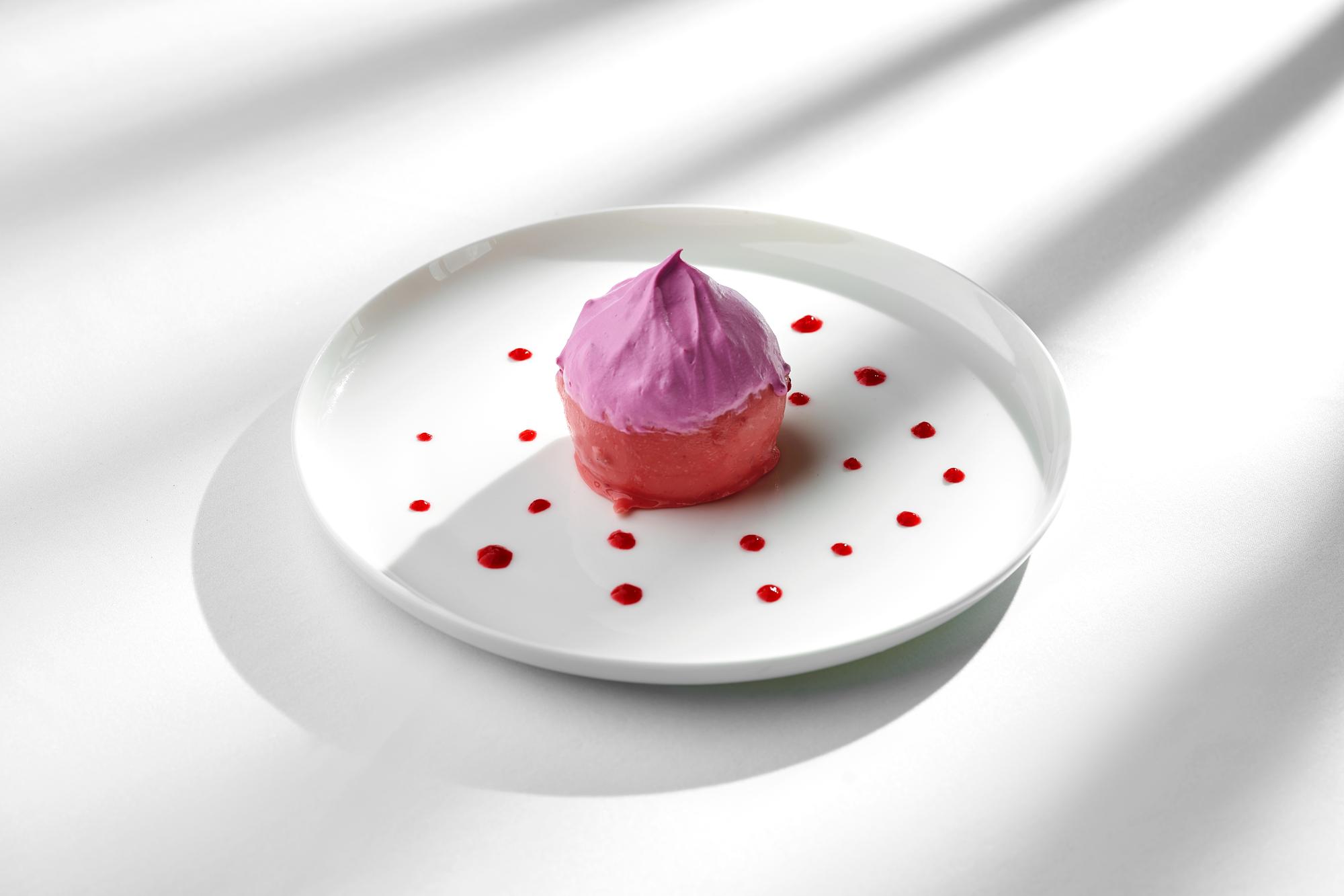 Plated dessert with geometric sauce